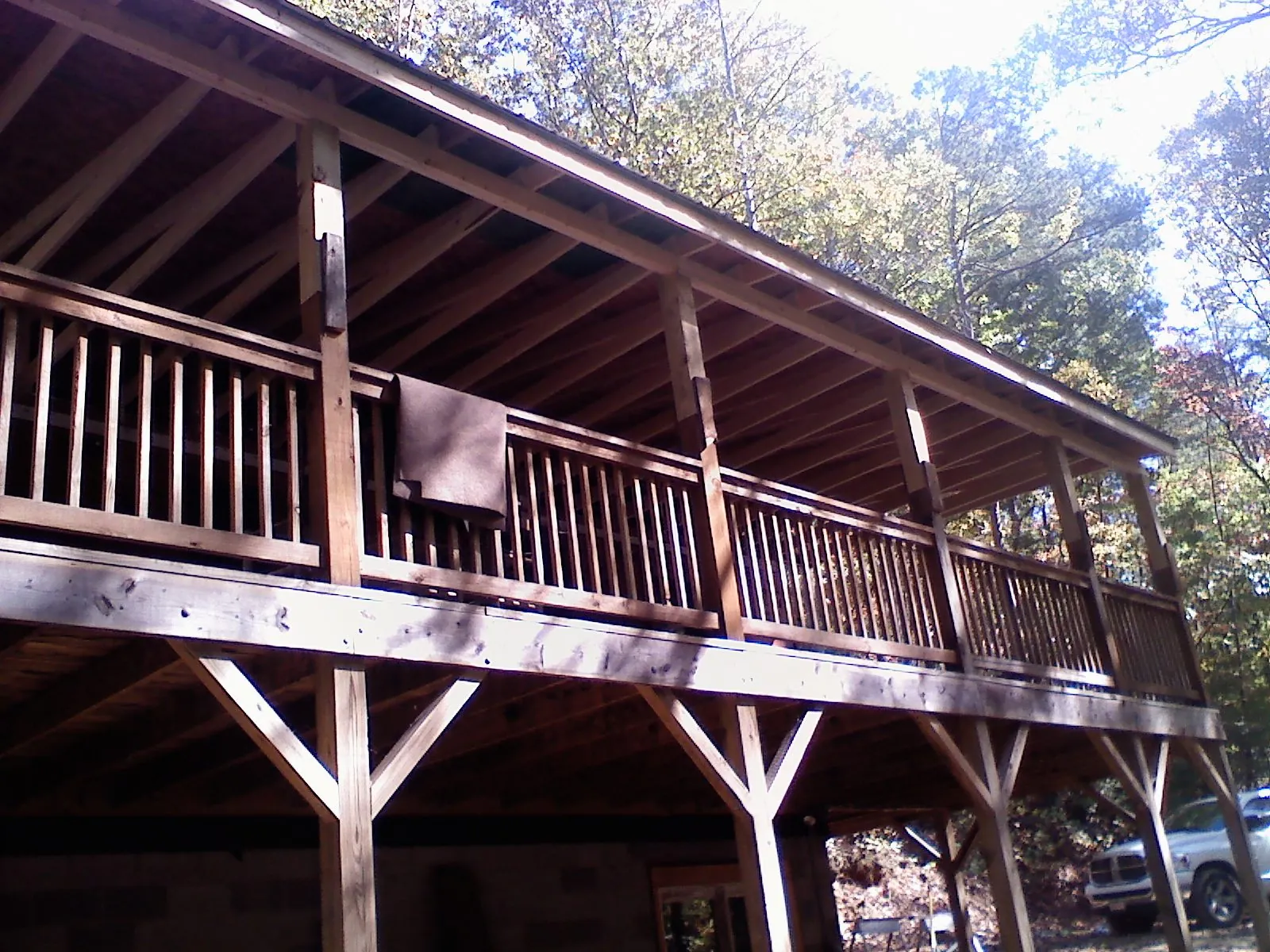 Timber framing under a new elevated porch and deck — Roof Leak Repair in Economy by Roofing Brothers